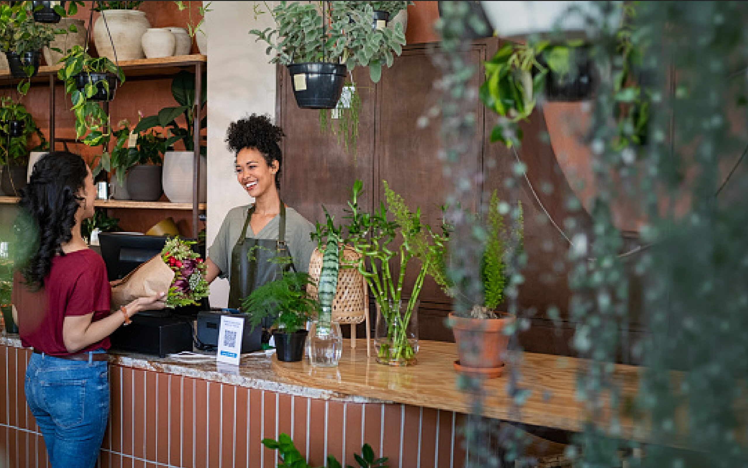 Girl buying flowers